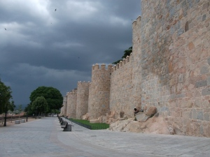 Avila city wall, with thunderstorm looming
